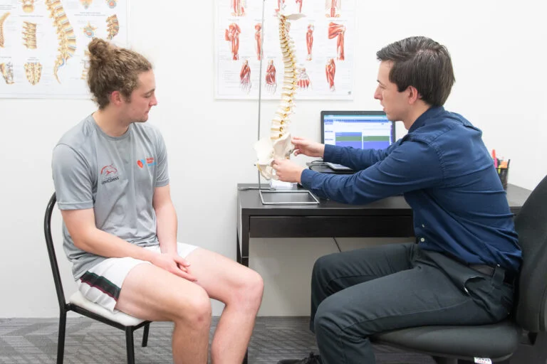 osteo consulting with patient